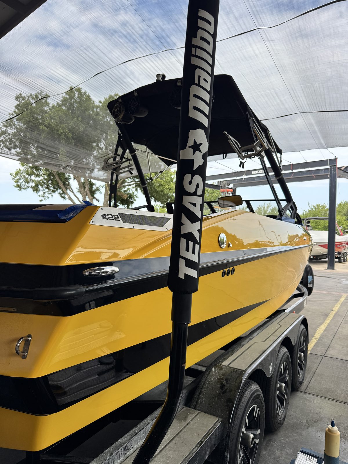 Malibu wakeboard boat in Texas Malibu colors — detailed by Deluxe Shield