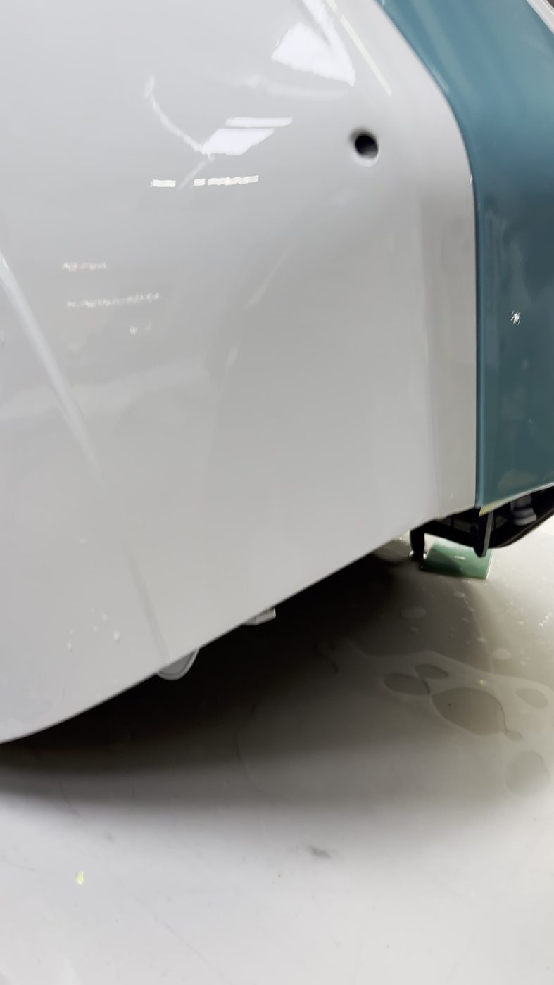 Yacht hull detail showing glossy protected finish
